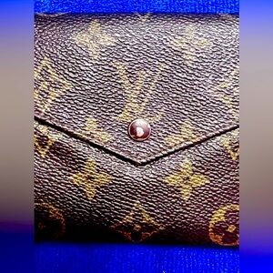 LV monogrammed,vintage, stamped, trifold wallet & dust bag. Purchased Paris 1980